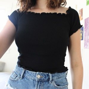 Off the shoulder ribbed black lettuce hem shirt
